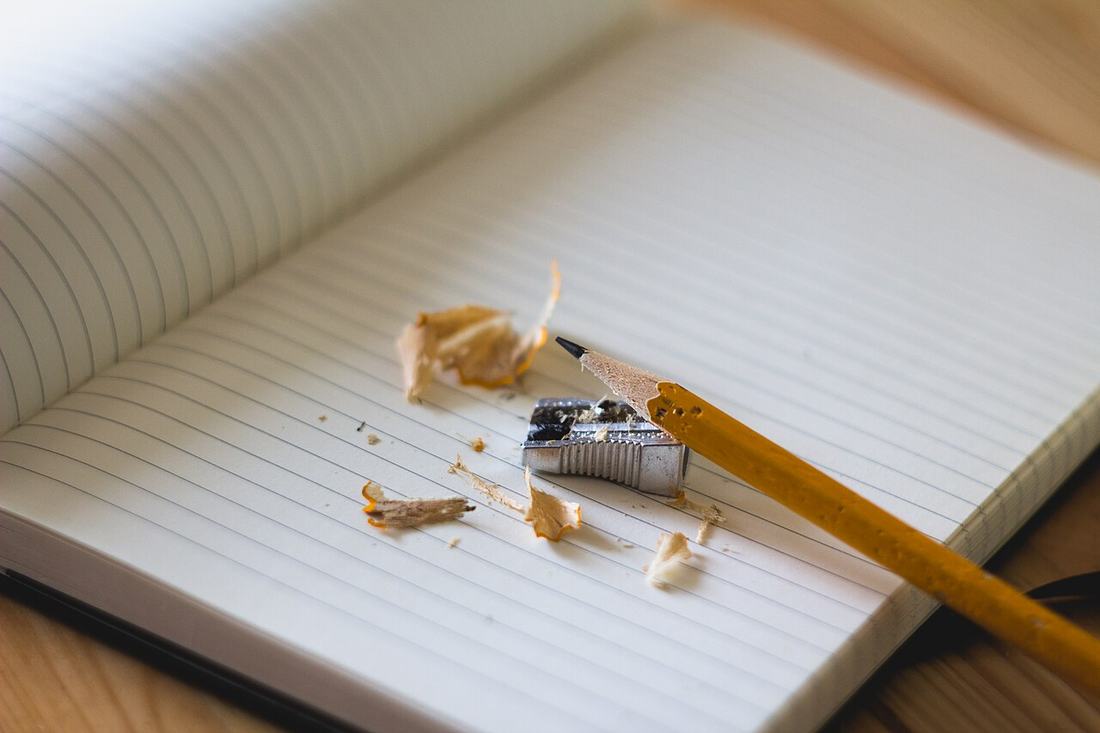 Pencil shavings on a notebook